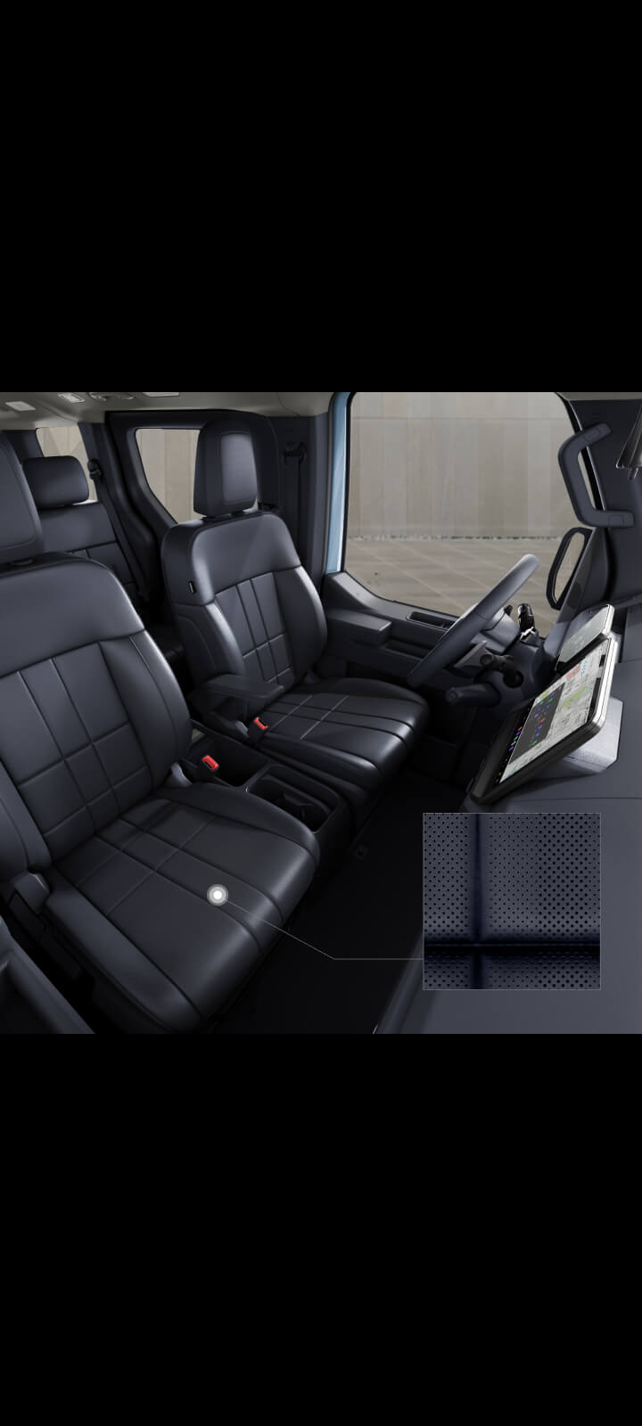 Fahrer- und Beifahrersitz im Innenraum des Kia PV5 Passenger.